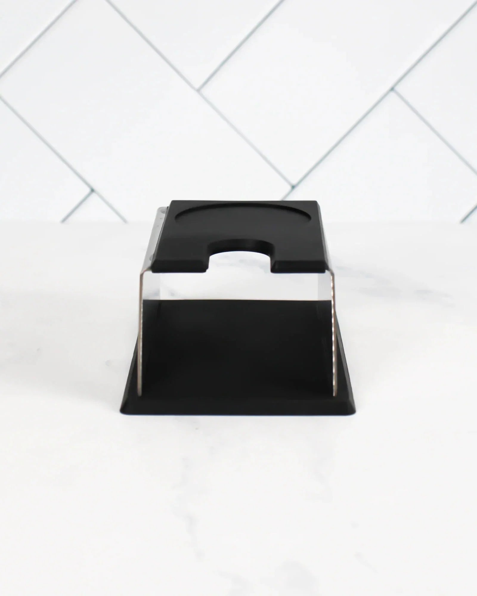 Tamping station
